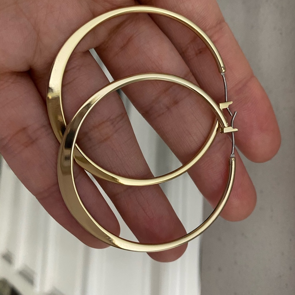 Ralph Lauren gold hoops, never used.